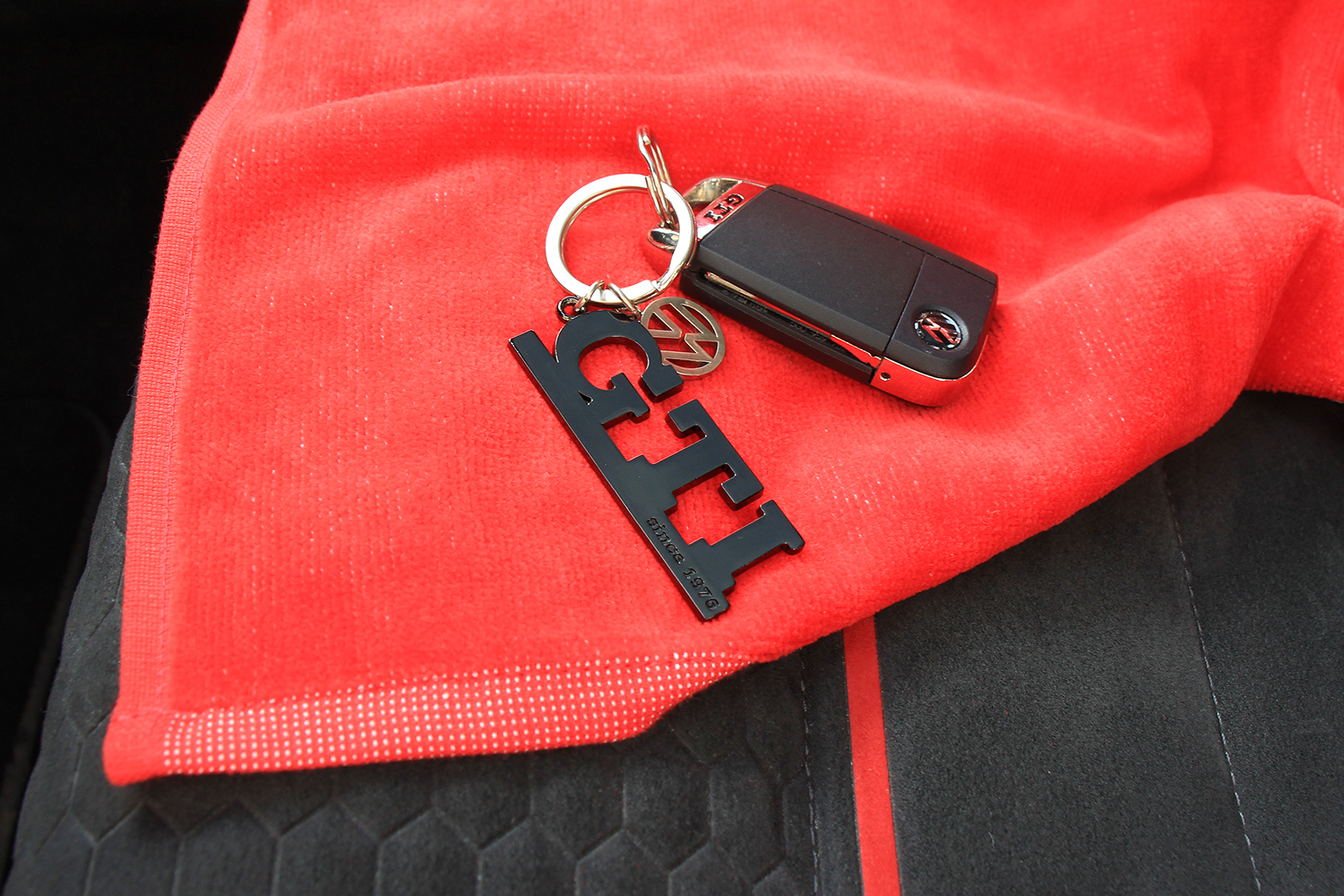 GTI Schlüsselanhänger mit Charm in Sichtverpackung - since 1976, Farbe:  schwarz